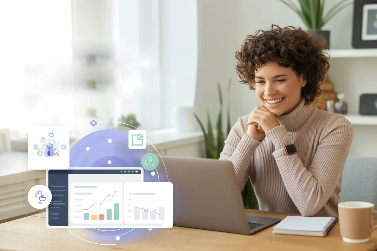 Happy woman in front of her laptop at a desk
