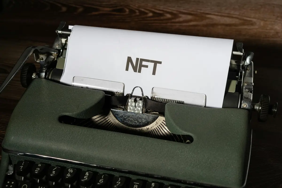 'NFT' typed on a typewriter