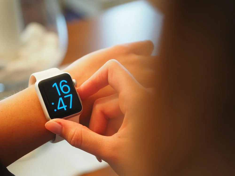 Person setting their smart watch