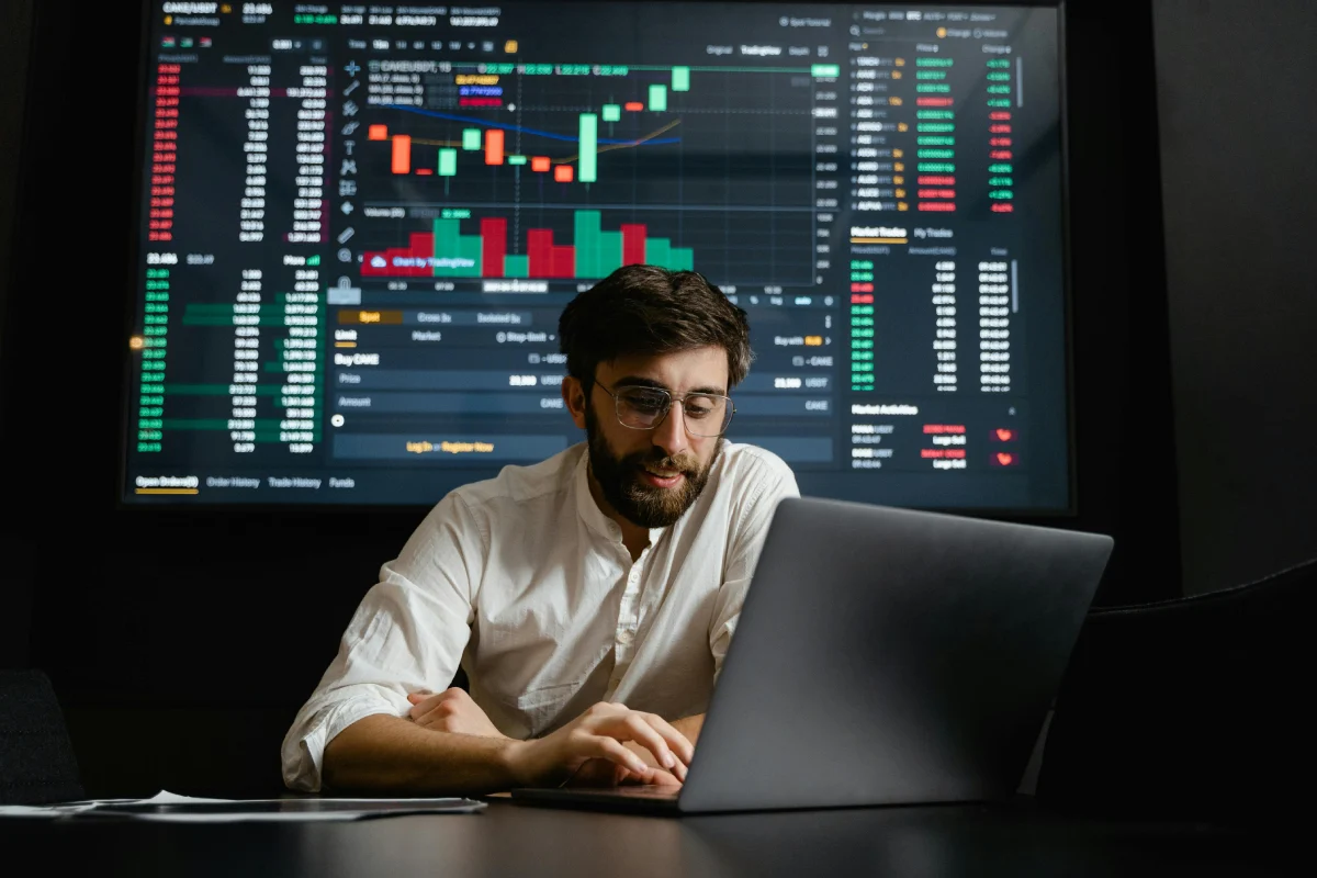 Man sitting at a desk working on a dApp