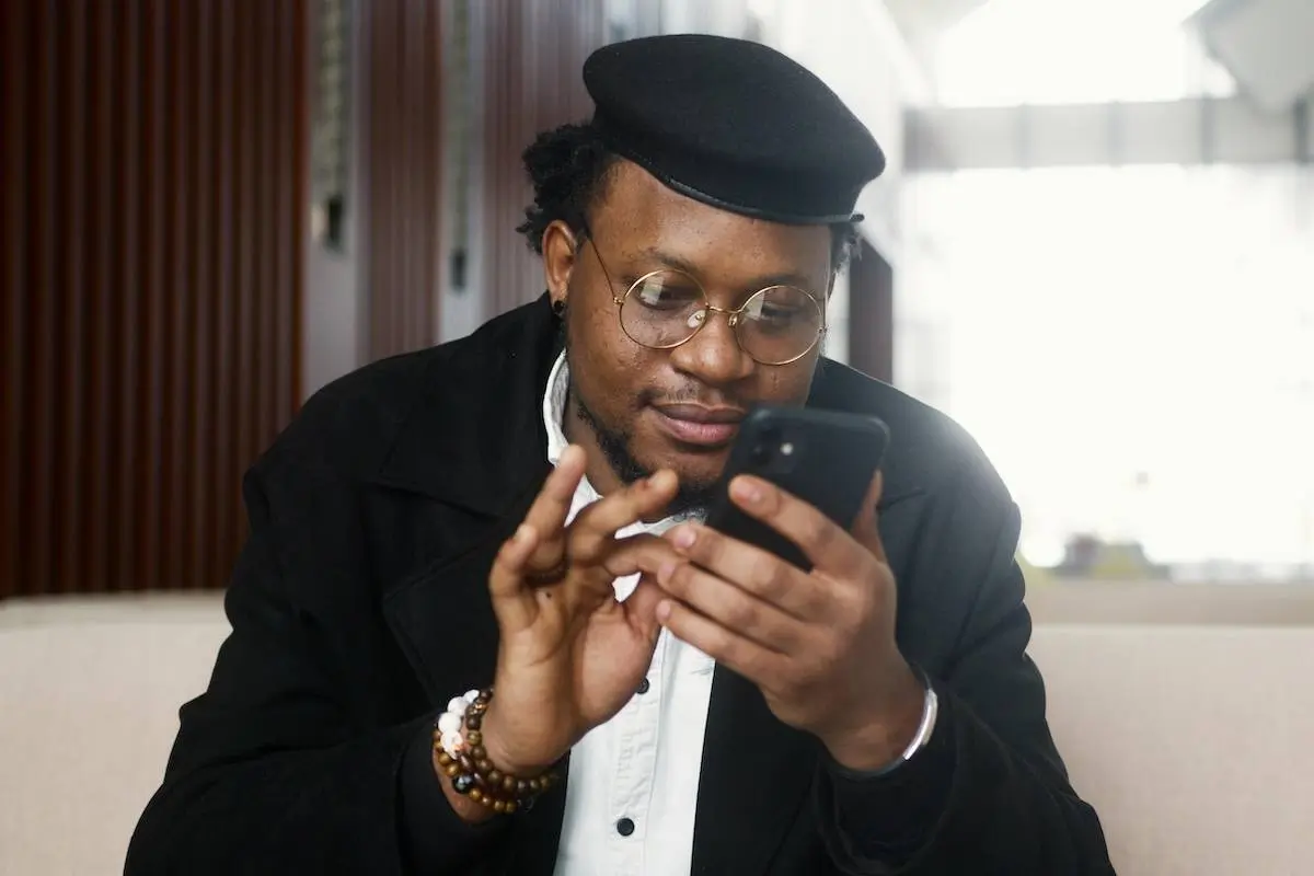 Man using a web3 app on his phone