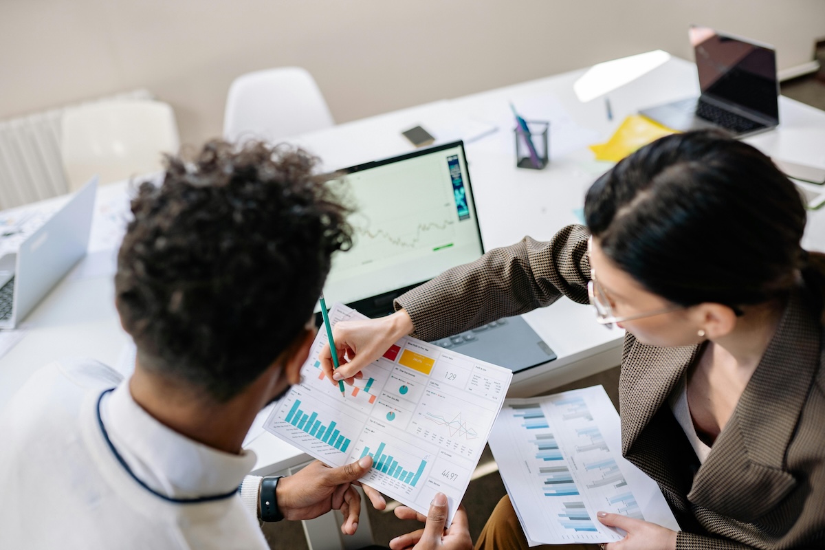 Two people working on the multichannel marketing campaign