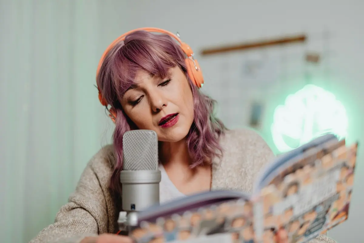 A woman reading AI content out loud by Kaboompics. com on Pexels. com