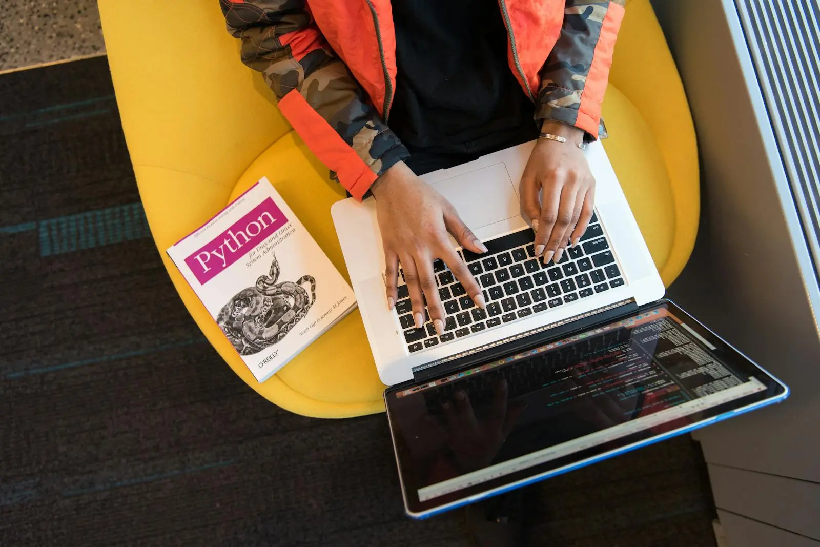 Woman Programming on a Notebook by Christina Morillo on pexel.com