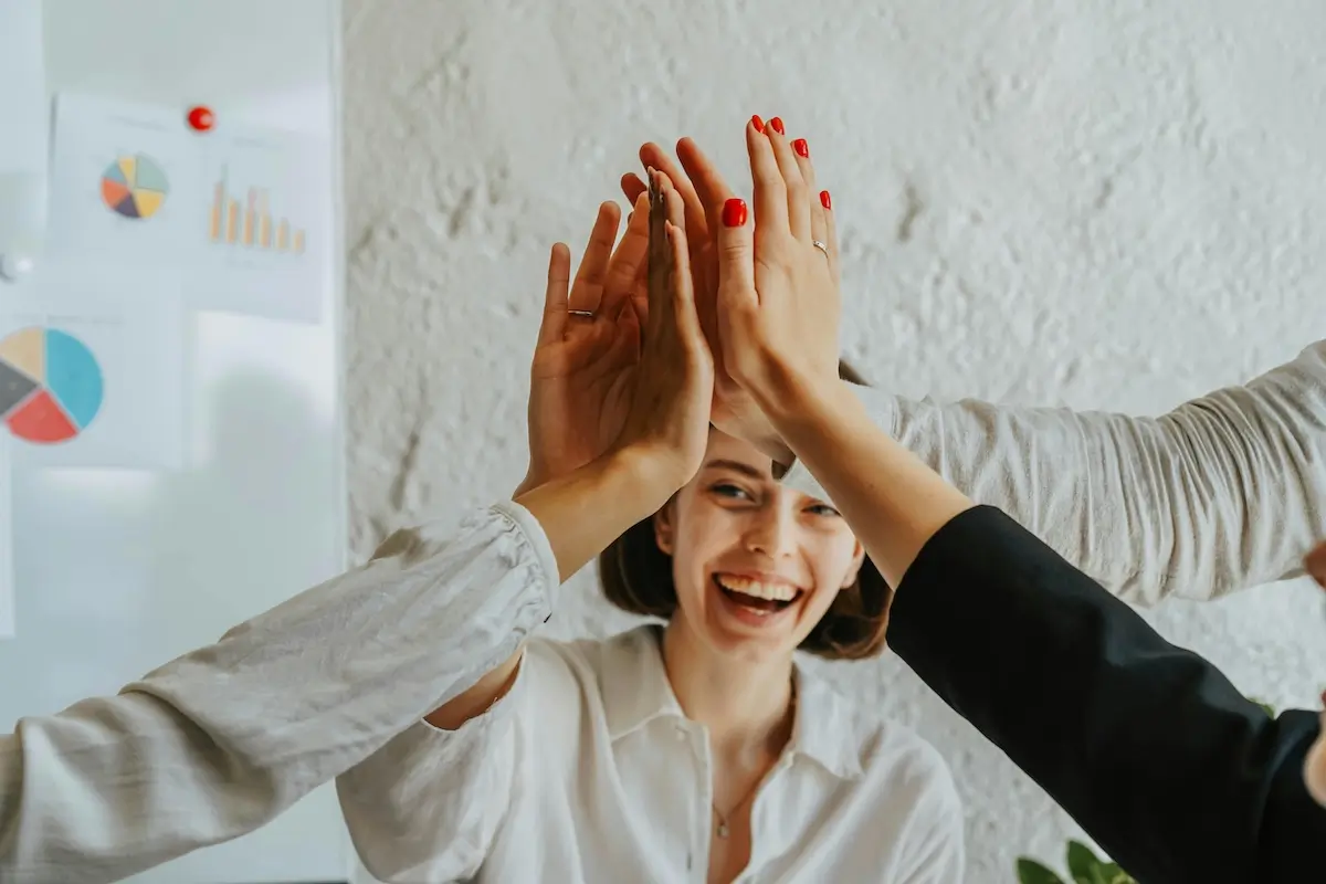 Happy workteam using Insightful.io by olia danilevich on Pexels. com