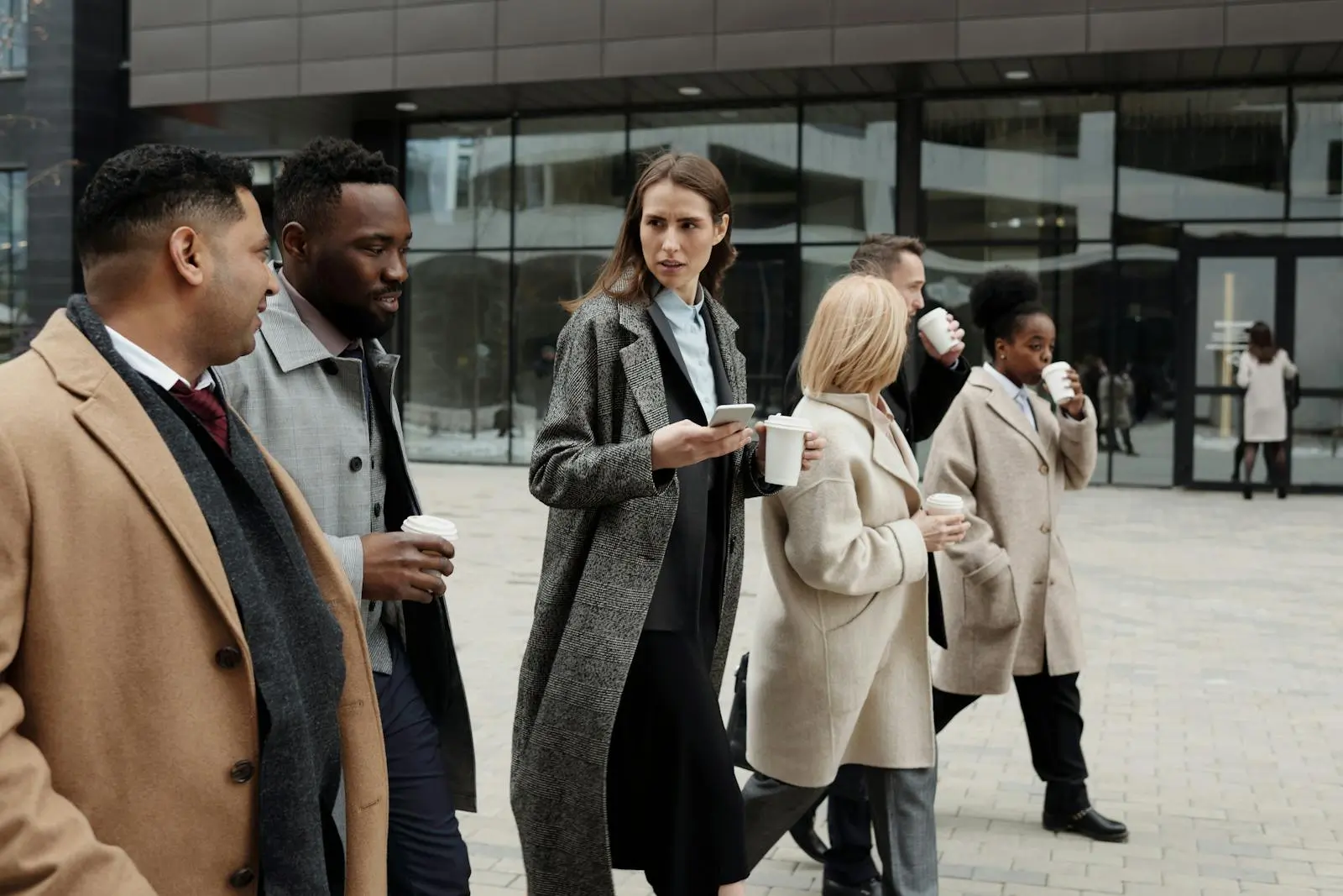 Business People taking a Coffee Break and Talking DAO by August de Richelieu on pexel.com