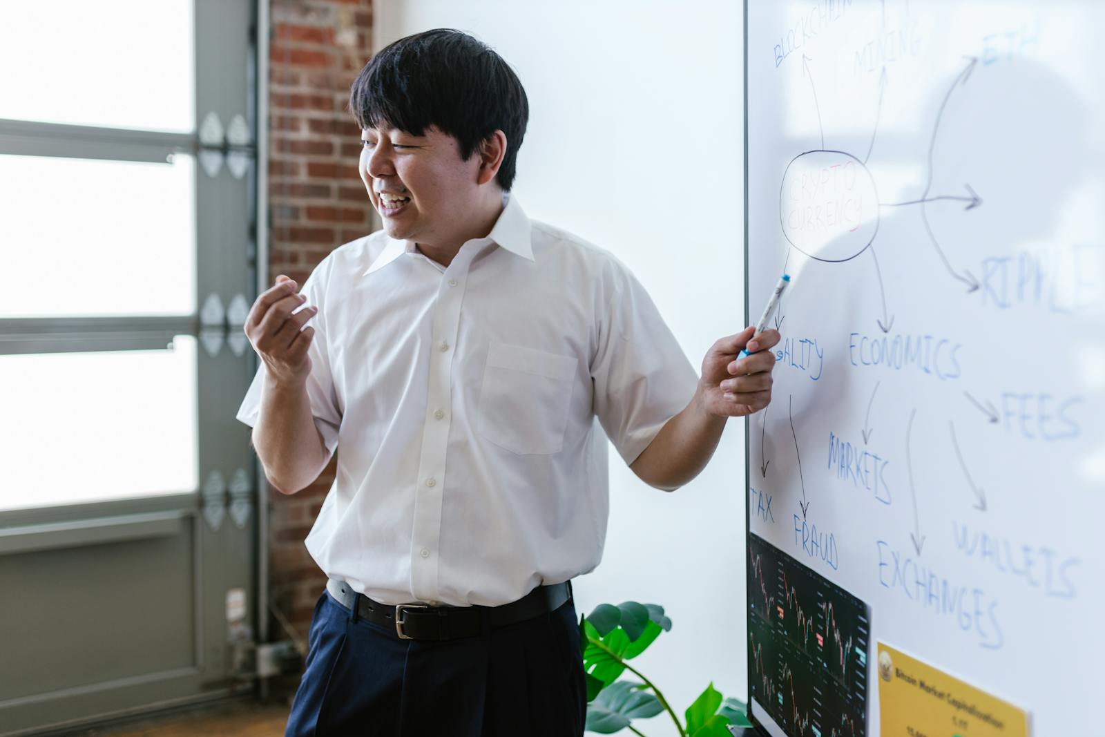 A Man in White Polo Shirt Smiling while Discussing How Base Makes Ethereum Faster and Affordable by RDNE Stock project on pexel.com