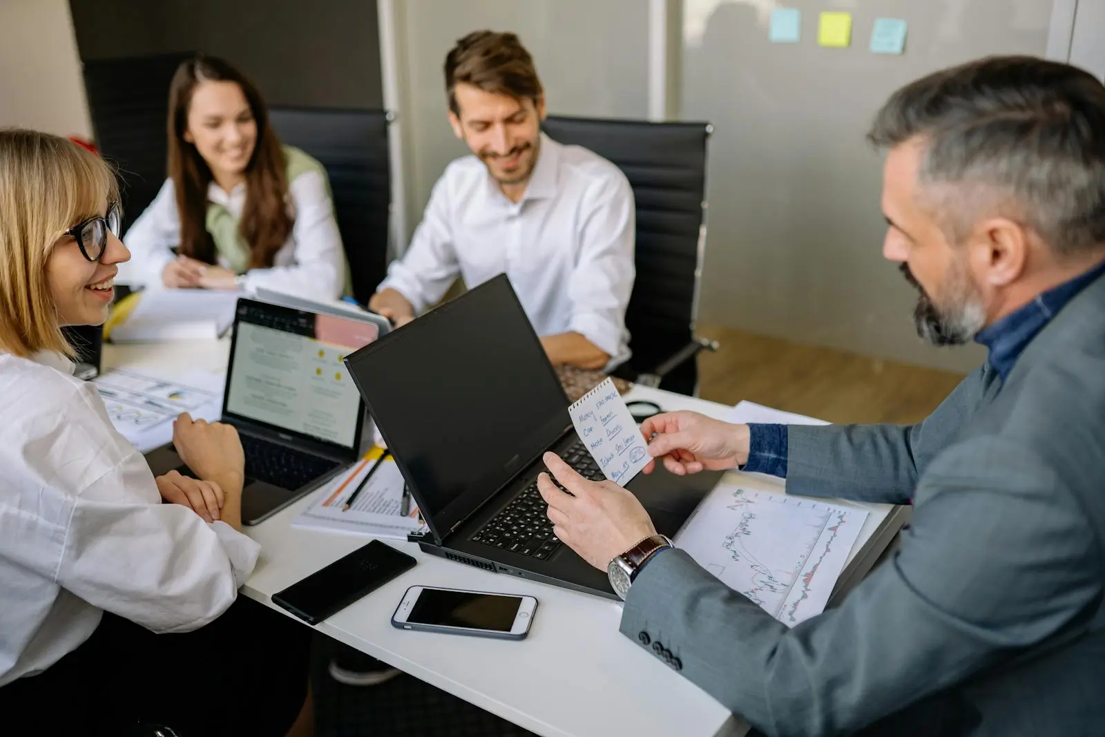 Employees Happily Having a Meeting with Their Boss by Yan Krukau on pexel.com
