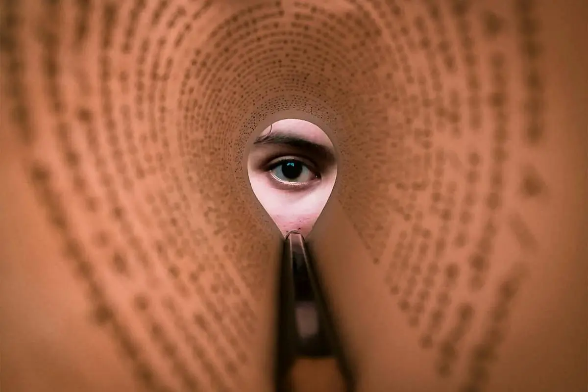 A human eye looking for ChatGPT down a curved paper with text on it by Ana Claudia Quevedo Estrada on pexels.com
