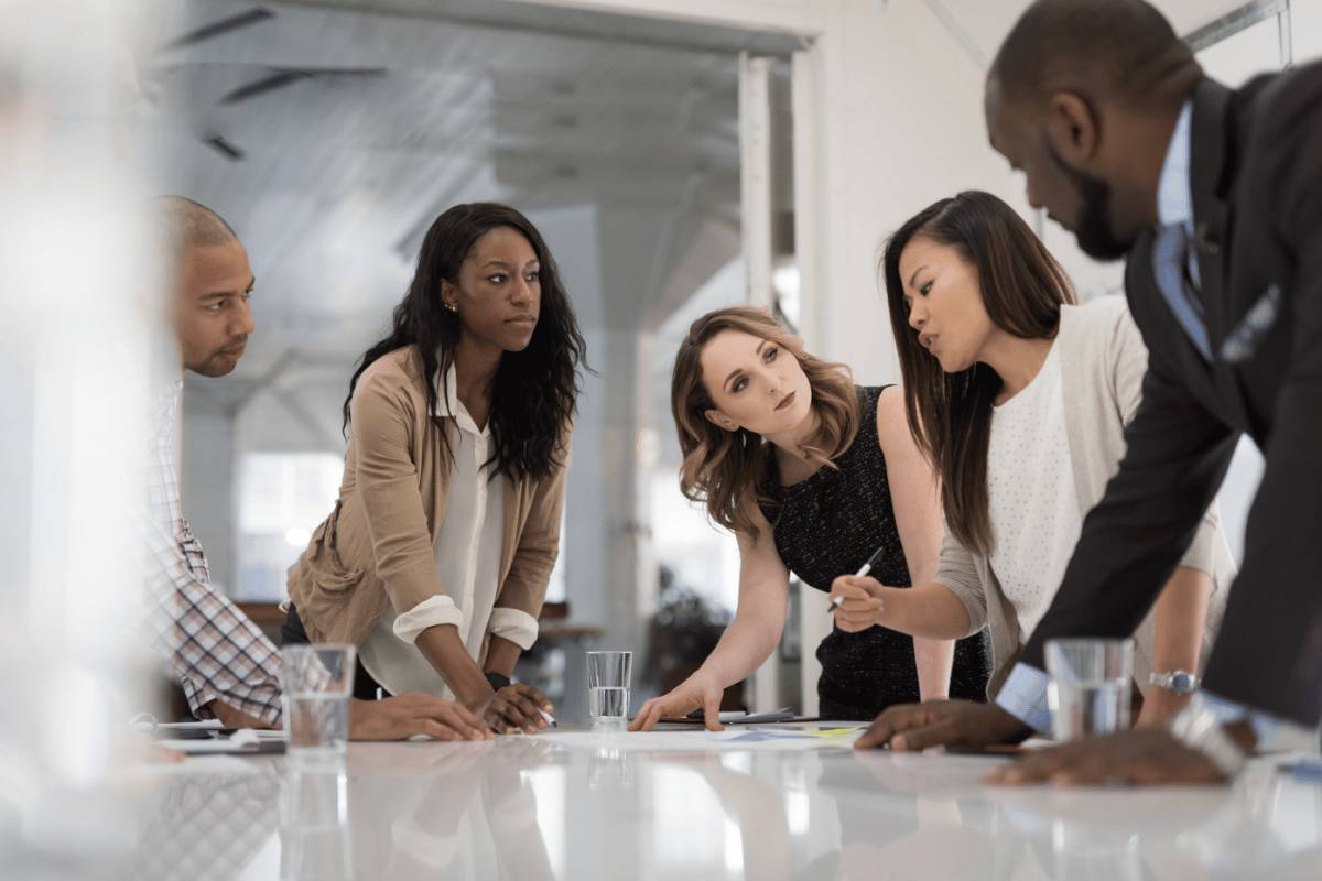 Business team discussing Solana growth strategies