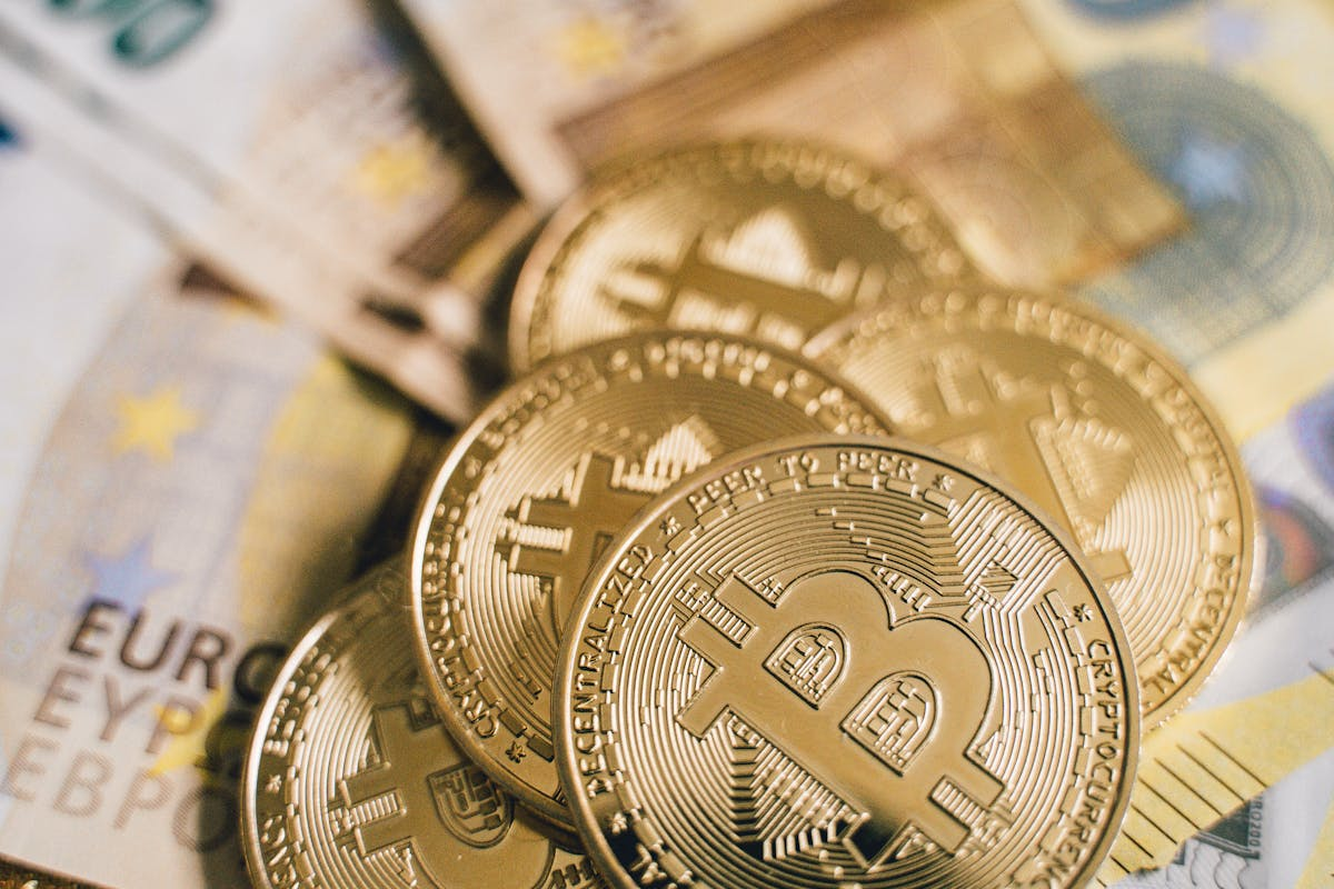 Freelancer showing Crypto and euro on the table by Alesia Kozik on pexel.com