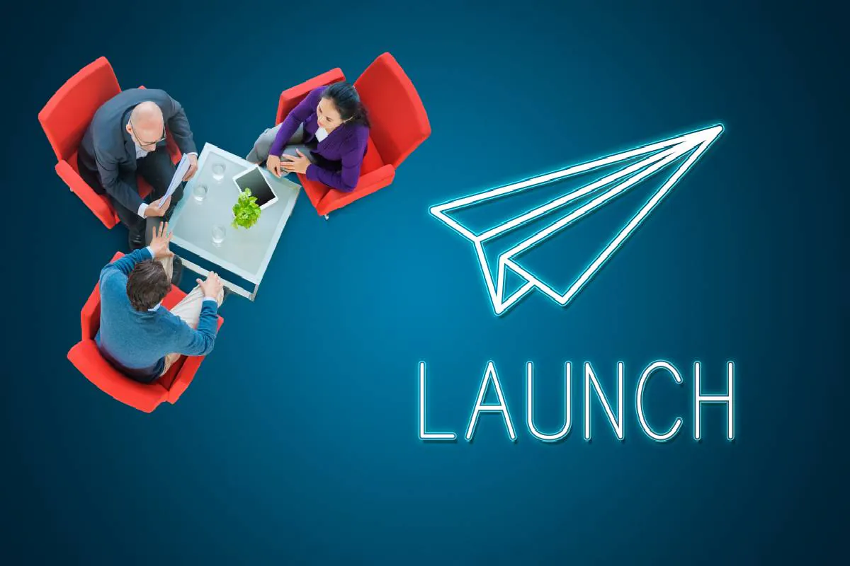 An image showing team on a meeting discussing token launch