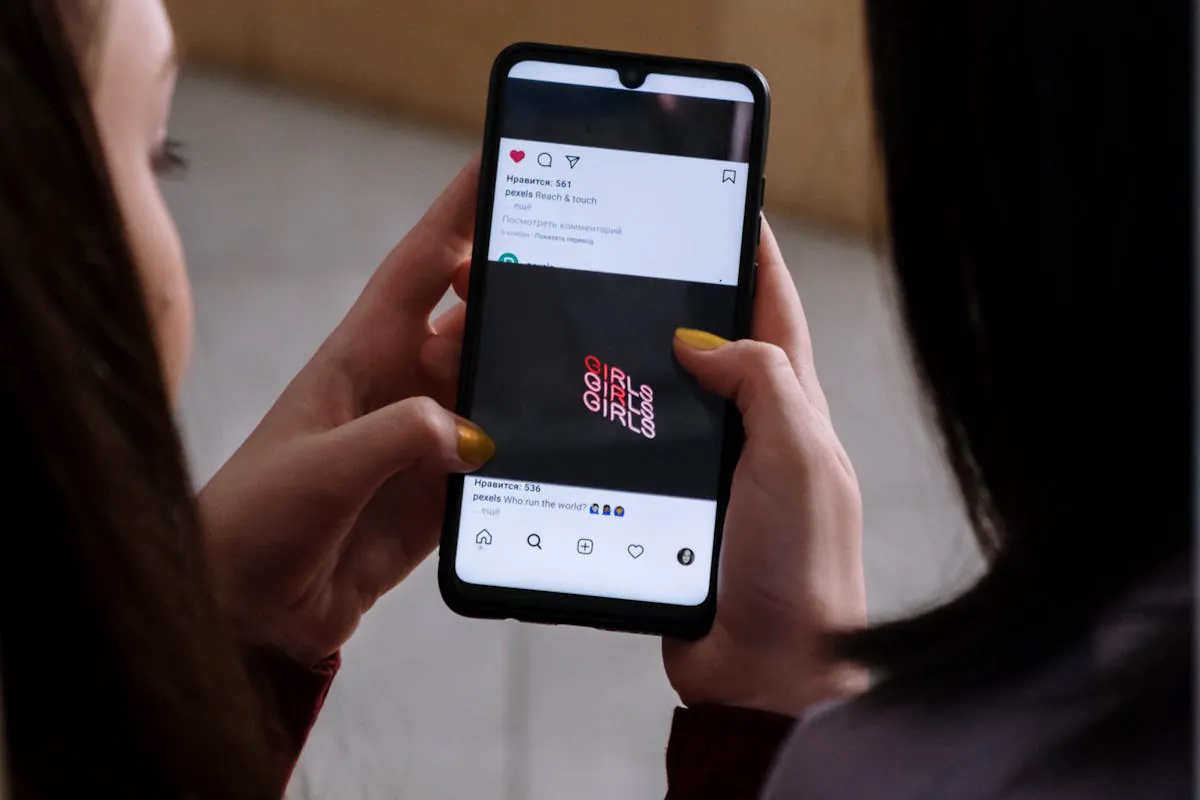 Close-Up Shot of a Person Looking at a Picture on Instagram Social network by cottonbro studio on pexel.com