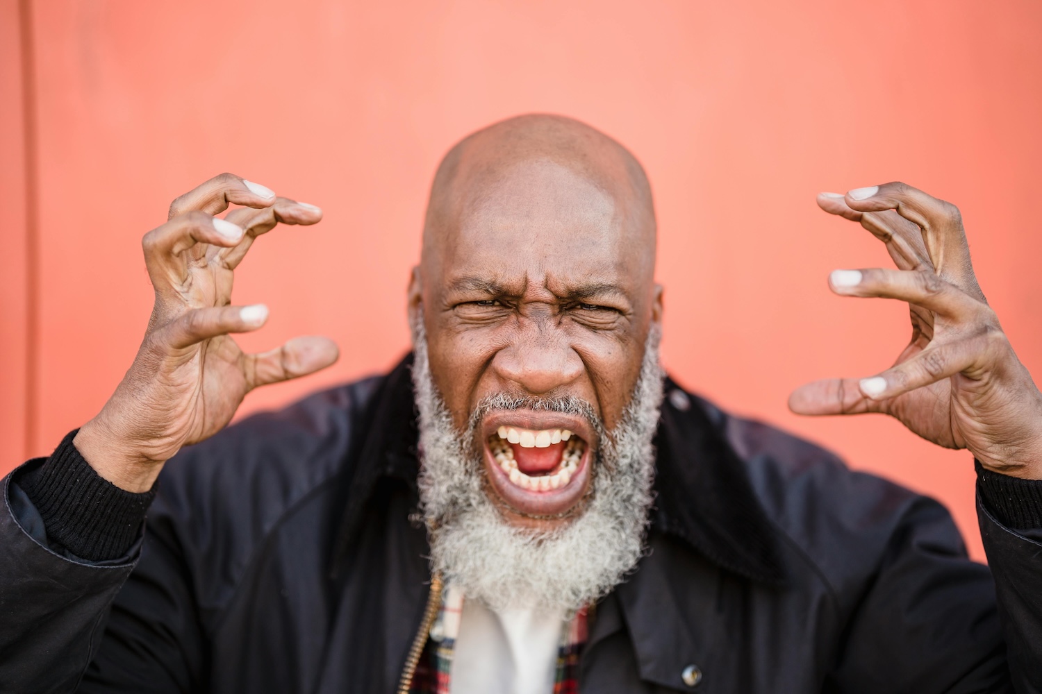 A bearded black man frustrated by his business' bad hires Nicola Barts on Pexels