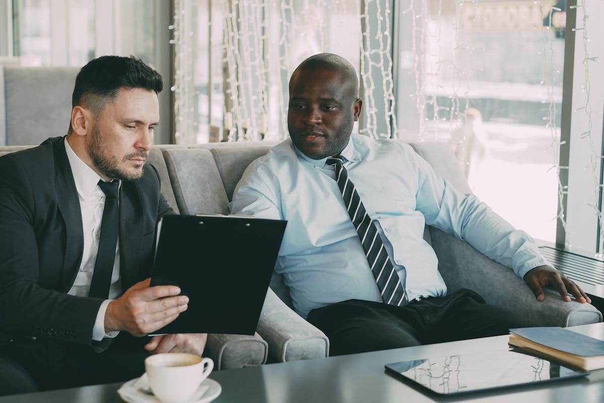 An image of institutional members discusing Real-World Asset tokenization