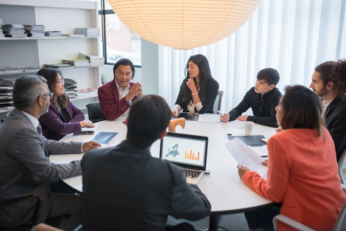 An image showing web3 team discussing cross-chain yield aggregators by Kampus Production