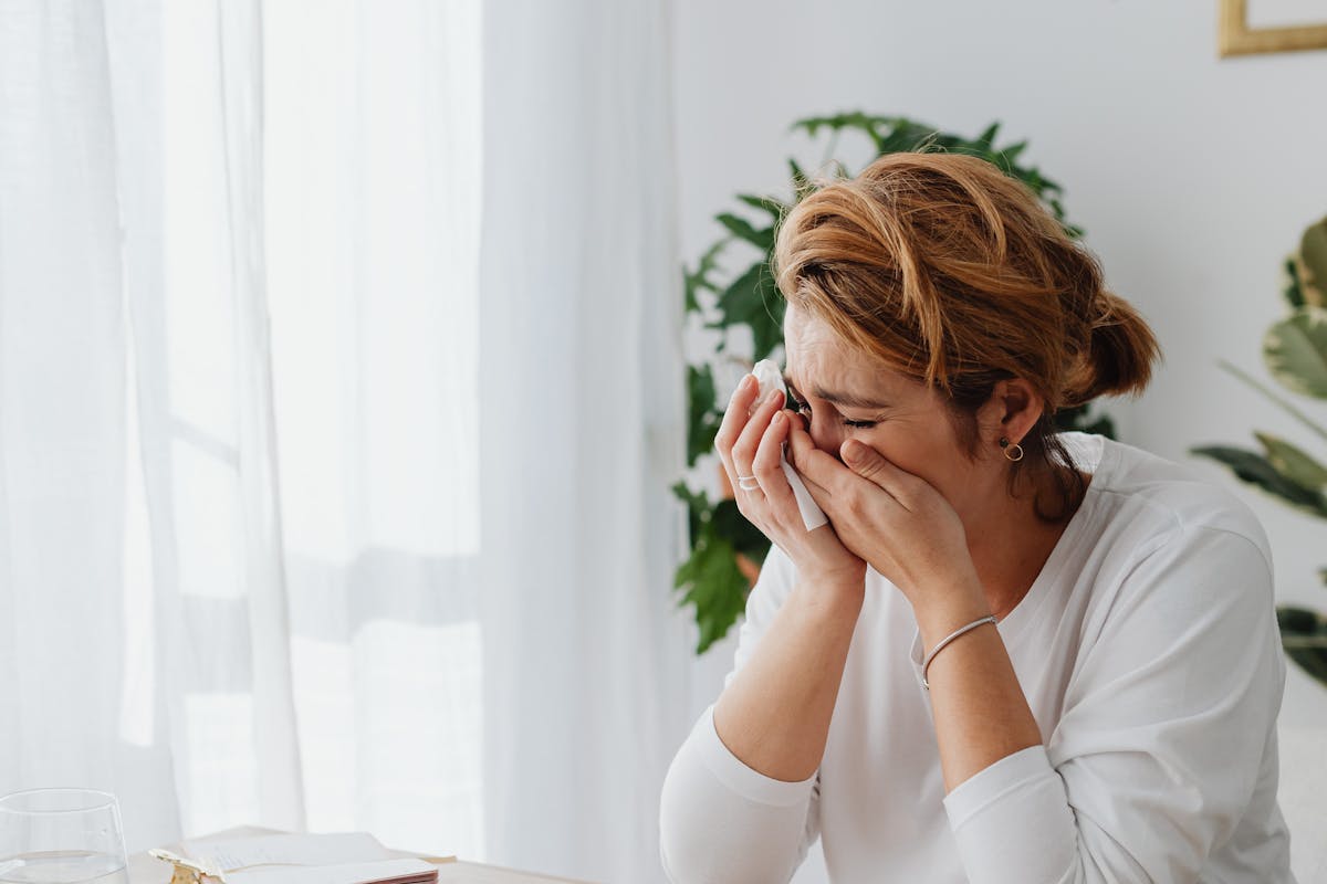 An image of a woman crying due to the mistakes leading Layer 2 Networks with High Fees or Delays by www.kaboompics.com