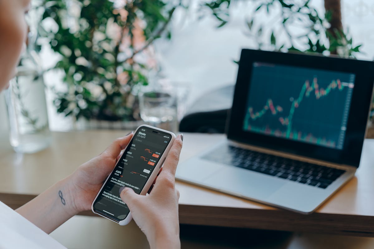 An image of a businesswoman checking her crypto portfolio by Mikhail Nilov