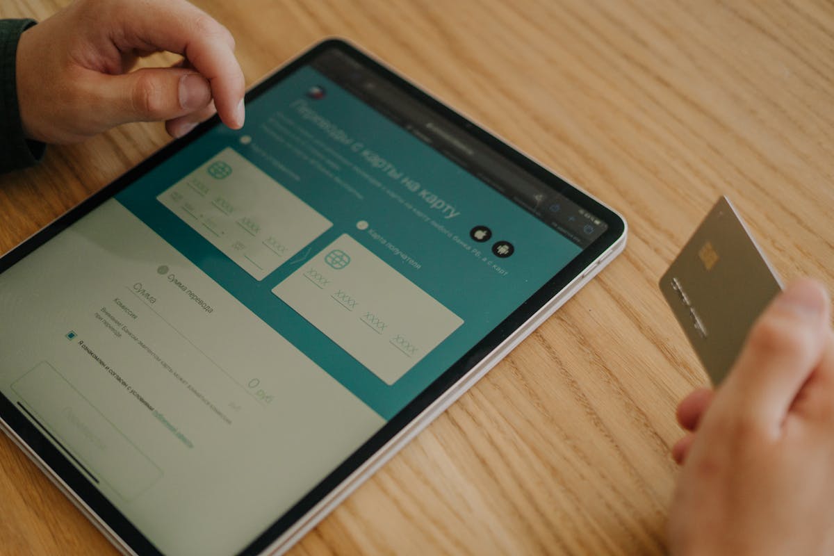 Someone making an online purchase using USDC transaction by Tima Miroshnichenko
