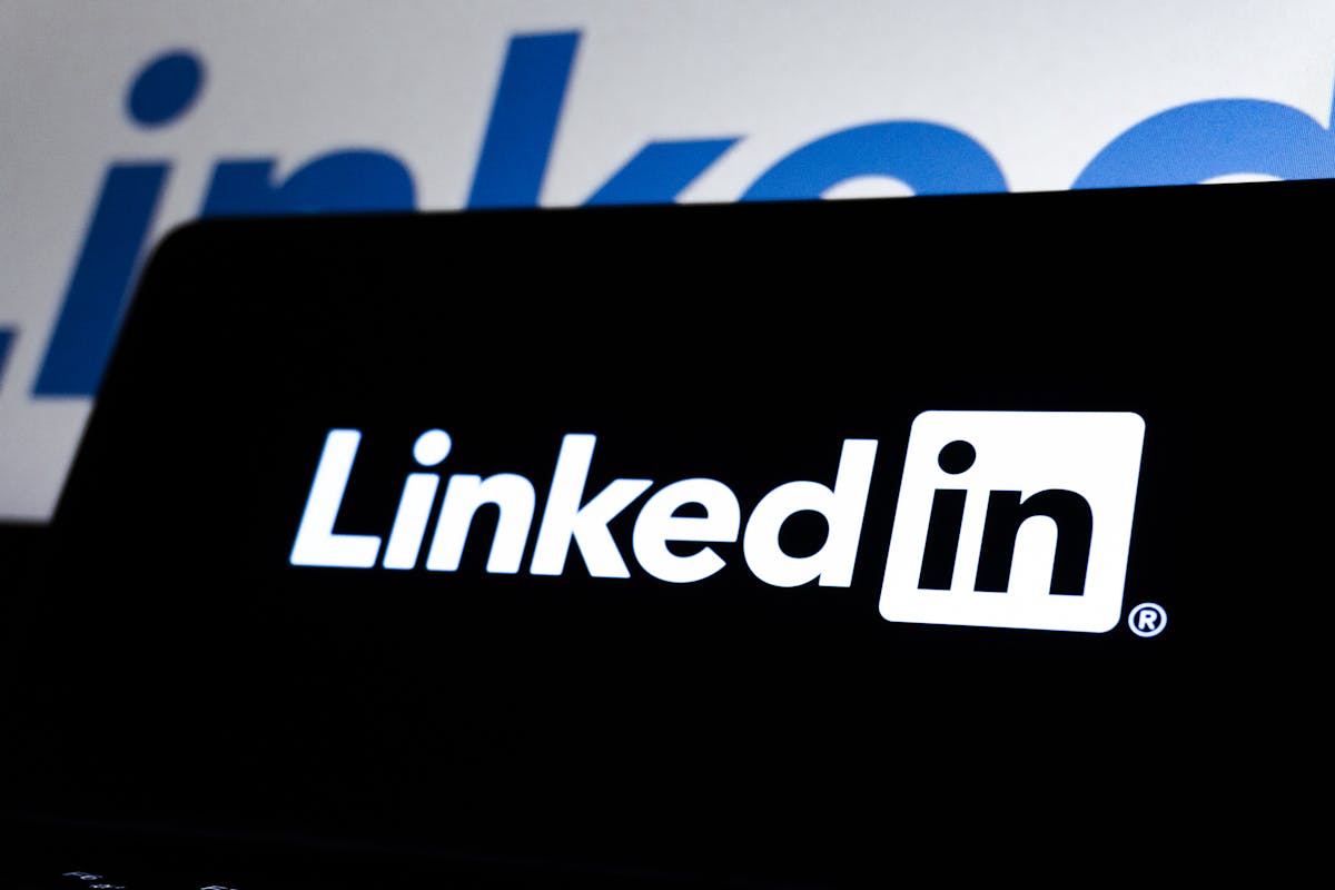 High contrast image of LinkedIn logo displayed prominently on a dark screen by Zulfugar Karimov