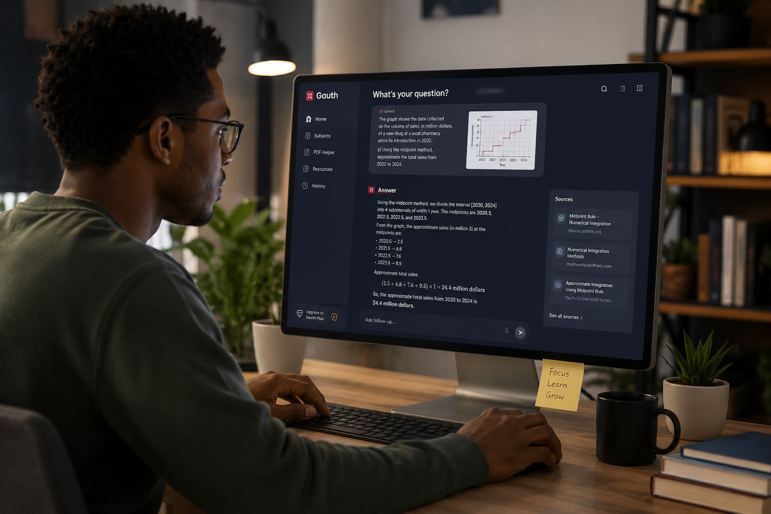 Young Black professional using ByteDance's Gauth AI on a desktop computer in a modern home office.