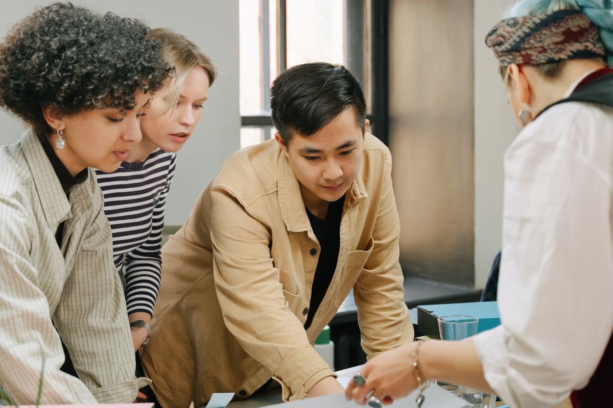 An image showing web3 team discussing crypto project by Ivan S