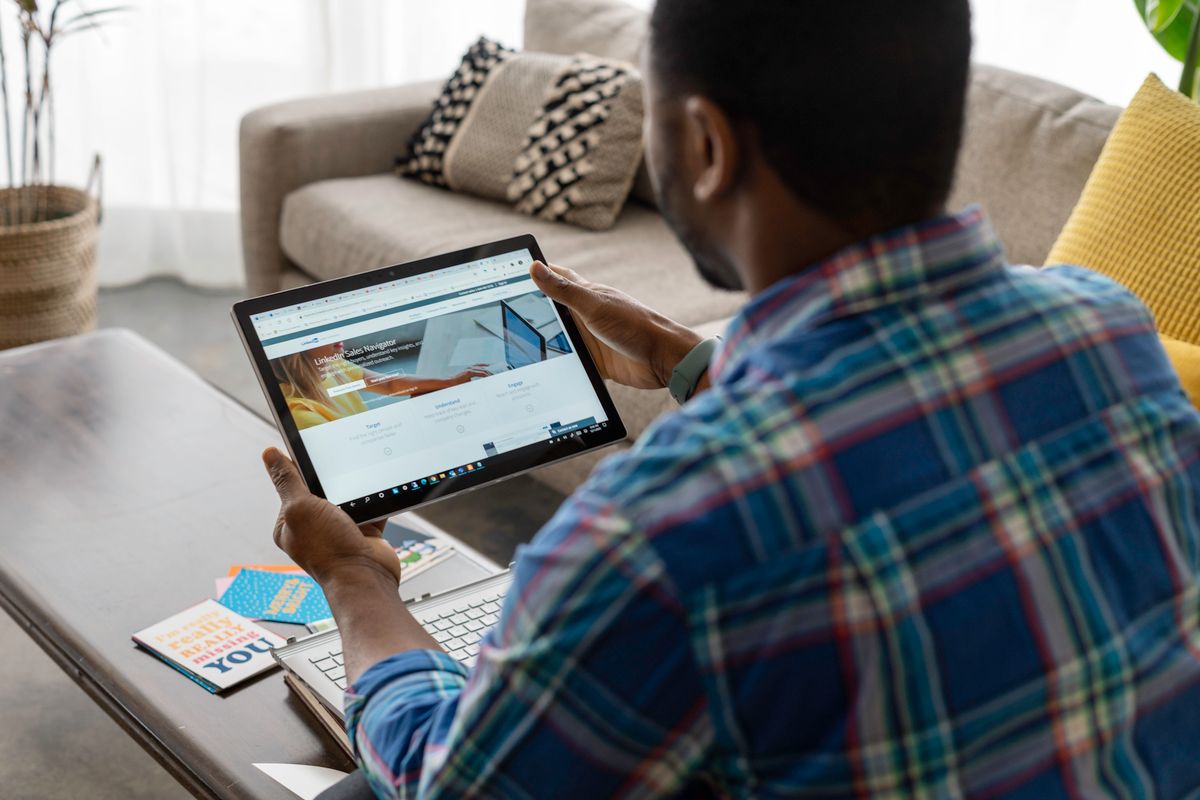 An image showing LinkedIn user reading AI + Blockchain by LinkedIn Sales Navigator